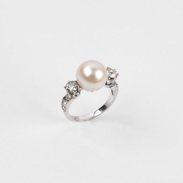 



ANELLO IN ORO BIANCO KT18 , DIAMANTI E PERLA