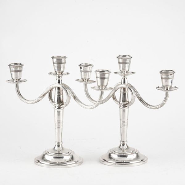



COPPIA DI CANDELABRI, FIRENZE, SECOLO XX  - Asta GIOIELLI E ARGENTI - Poggio Bracciolini Casa d'Aste