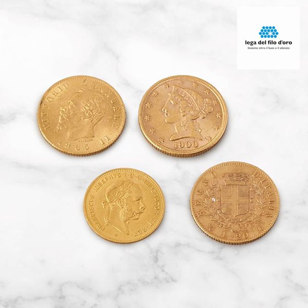 



DUE MONETE MARENGO LIRE 20 IN ORO 900/1000