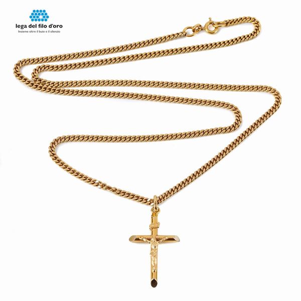 



COLLANA IN ORO GIALLO 18KT CON PENDENTE A CROCEFISSO 