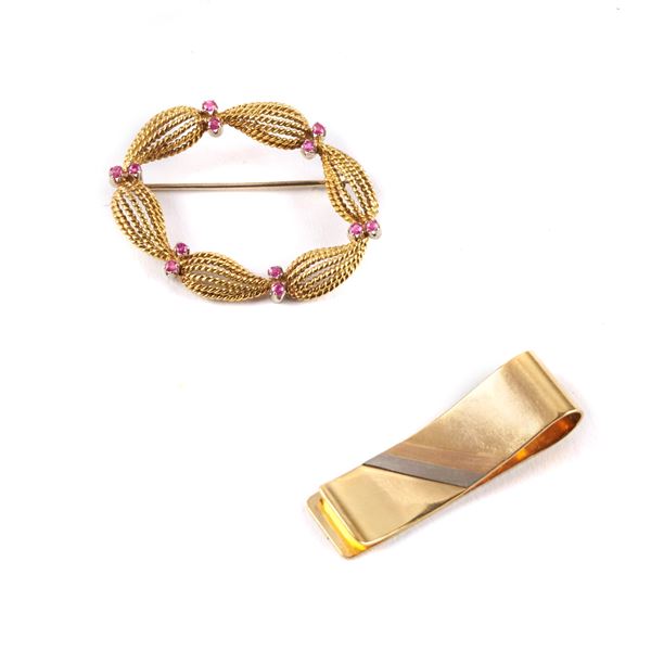 



FERMASOLDI E SPILLA OVALE IN ORO GIALLO 18KT