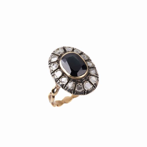 



ANELLO IN ORO GIALLO 18KT,ARGENTO,ZAFFIRO E DIAMANTI