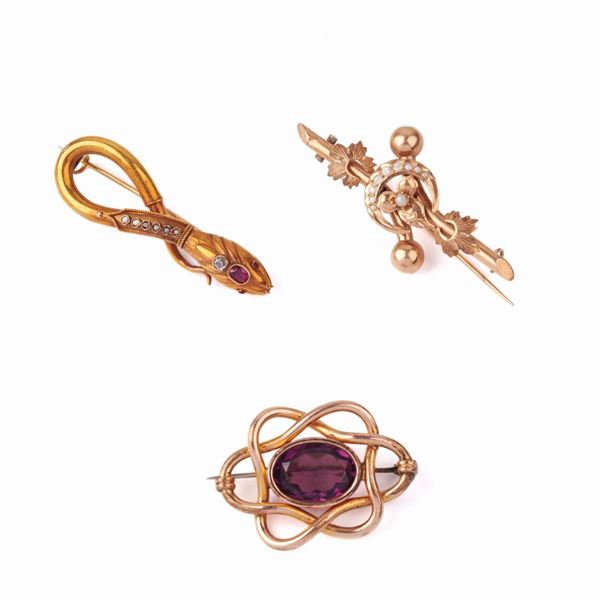 



DUE&nbsp; SPILLE IN ORO GIALLO 18KT , DIAMANTI E PIETRE