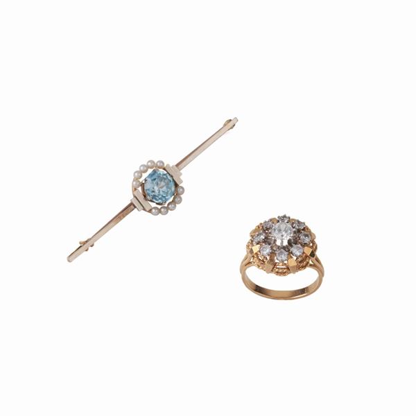 



ANELLO IN ORO GIALLO 18 KT E PIETRE
