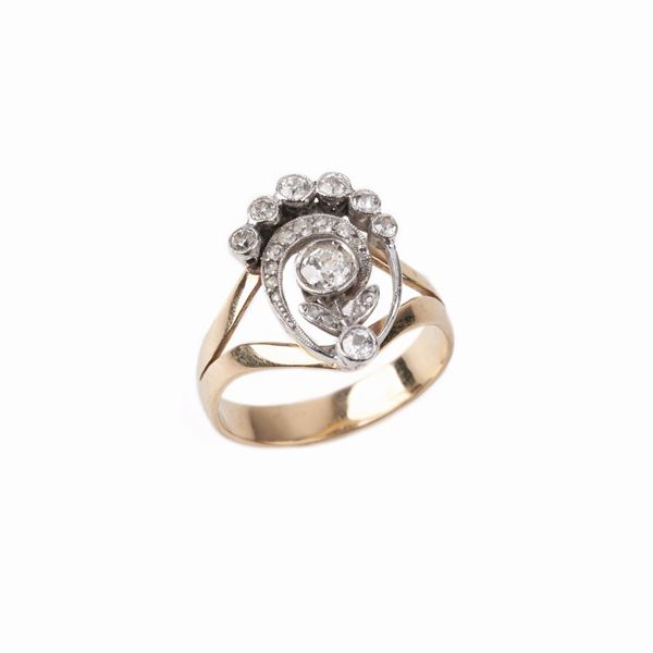 



ANELLO IN ORO GIALLO, ORO BIANCO&nbsp; 18 KT E DIAMANTI
