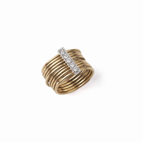 



ANELLO IN ORO GIALLO 18KT E DIAMANTI
