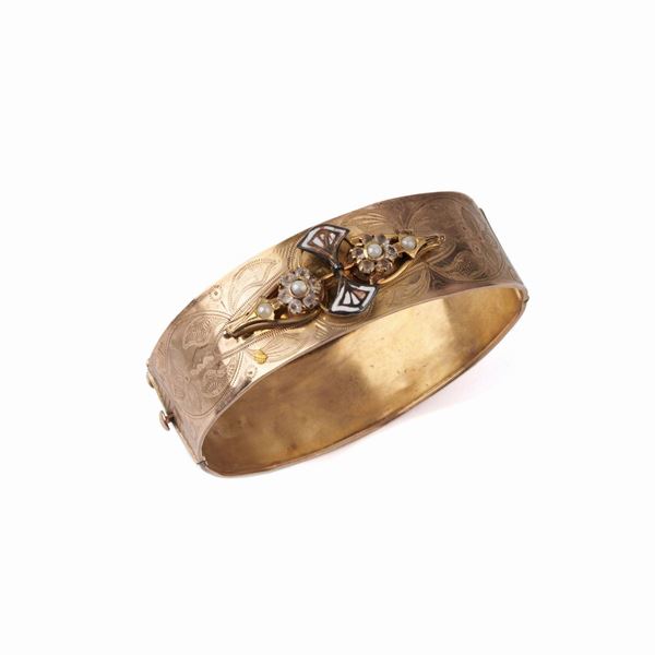 



BRACCIALE RIGIDO IN ORO A BASSO TITOLO 