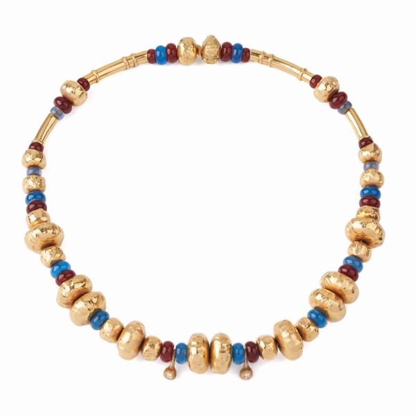 



COLLANA GIROCOLLO IN ORO 18KT E PIETRE