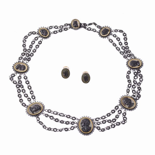 



COLLANA GIROCOLLO IN METALLO BRUNITO E CAMMEI