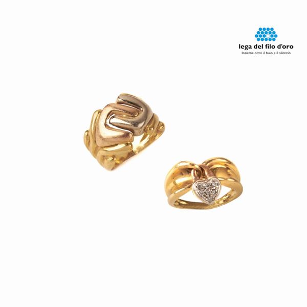 



DUE ANELLI IN ORO GIALLO 18 KT