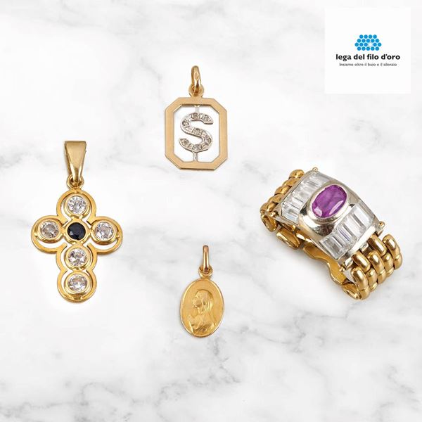 



ANELLO IN ORO 18KT E PIETRE