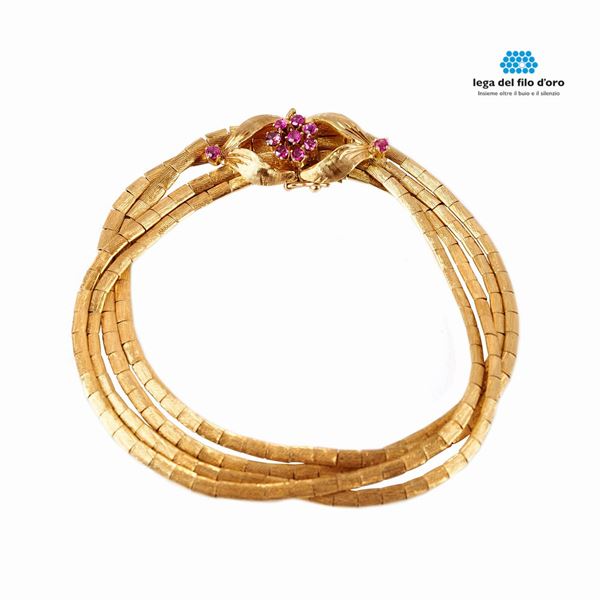 



BRACCIALE IN ORO GIALLO 18KT E RUBINI