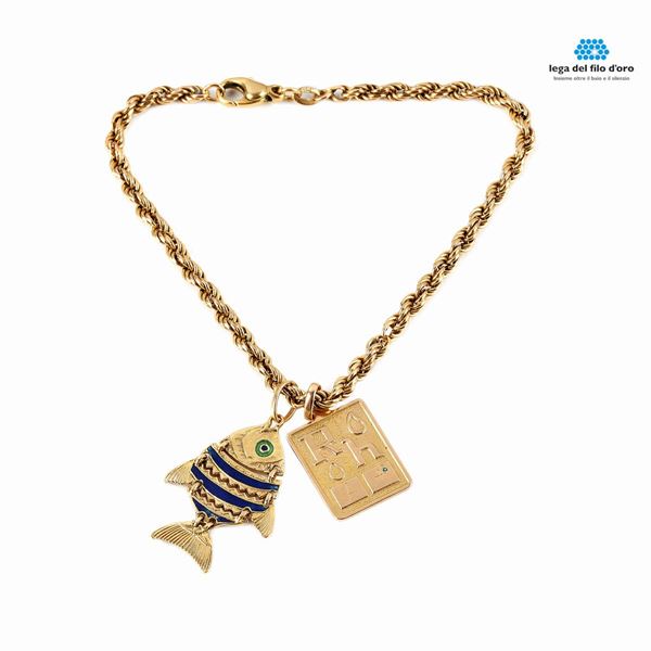 



BRACCIALE , E DUE PENDENTI IN ORO 18KT