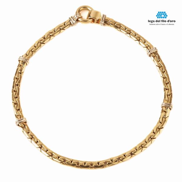 



COLLANA GIROCOLLO IN ORO GIALLO E ORO BIANCO 18 KT 