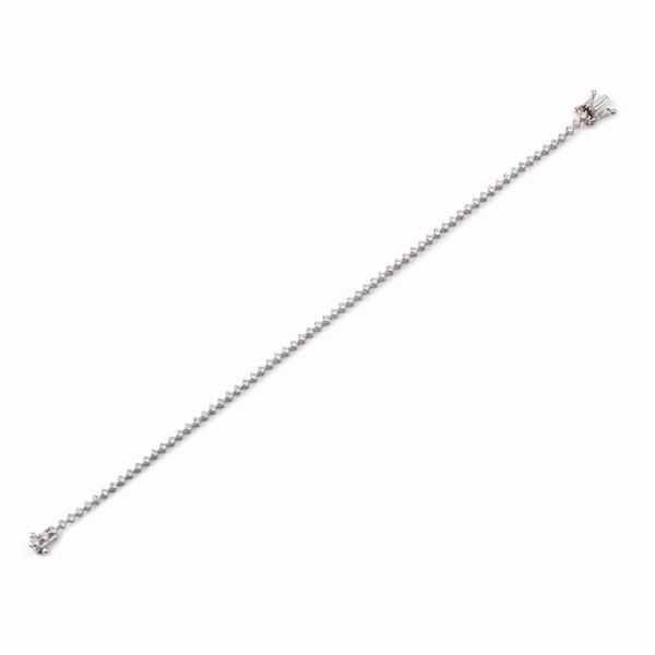 



BRACCIALE TENNIS IN ORO BIANCO KT 18 E DIAMANTI