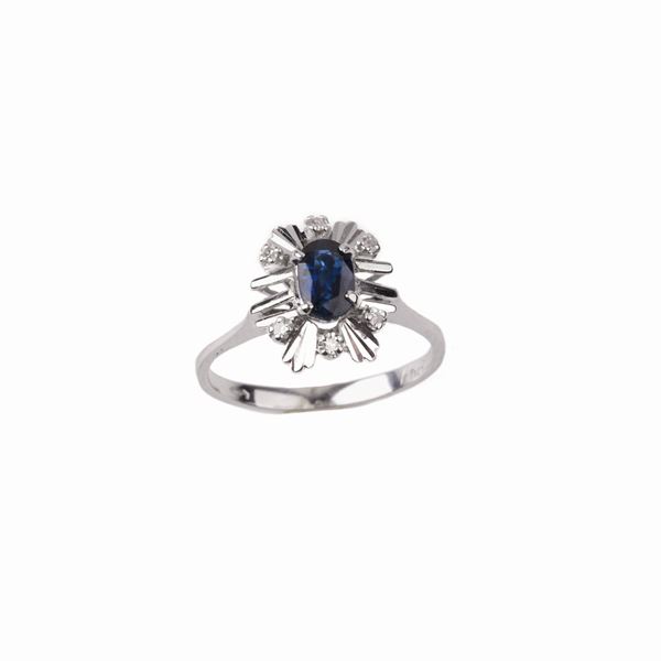 



ANELLO IN ORO BIANCO 18 KT DIAMANTI E ZAFFIRO