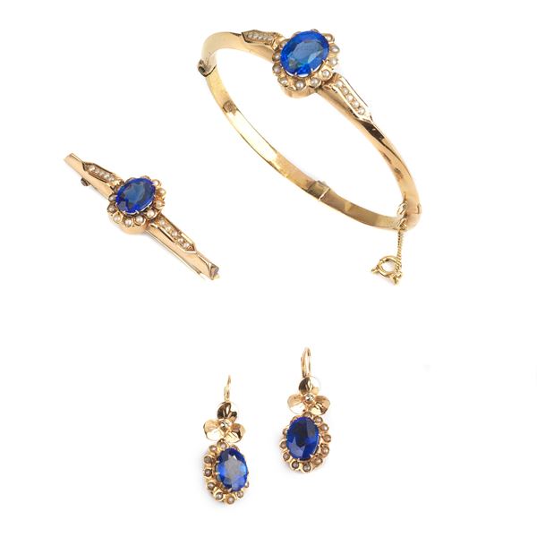 



PARURE IN ORO 18KT , MICROPERLE E PIETRE DI COLORE
