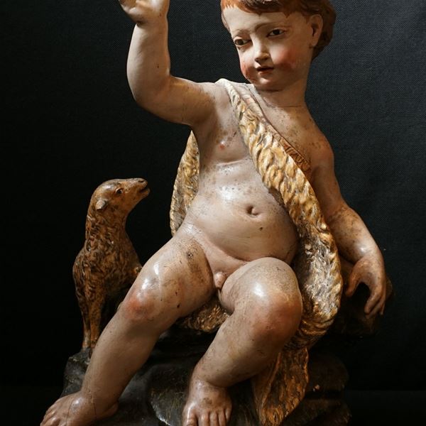 



Scultura, sec. XVIII, in legno policromo e intagliato, raffigurante San Giovannino, cm 57x40