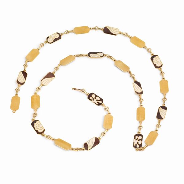 



LUNGA COLLANA IN ORO 18KT CON SMALTI