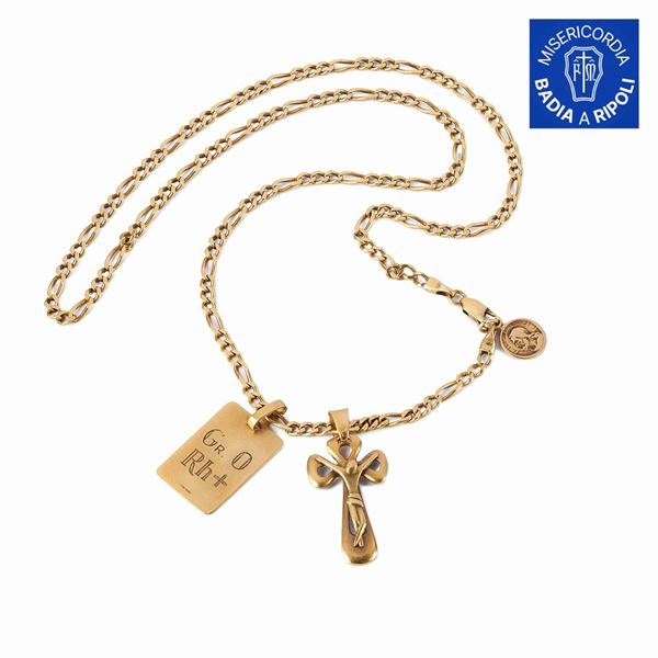 



COLLANA IN ORO GIALLO 18KT E TRE PENDENTI