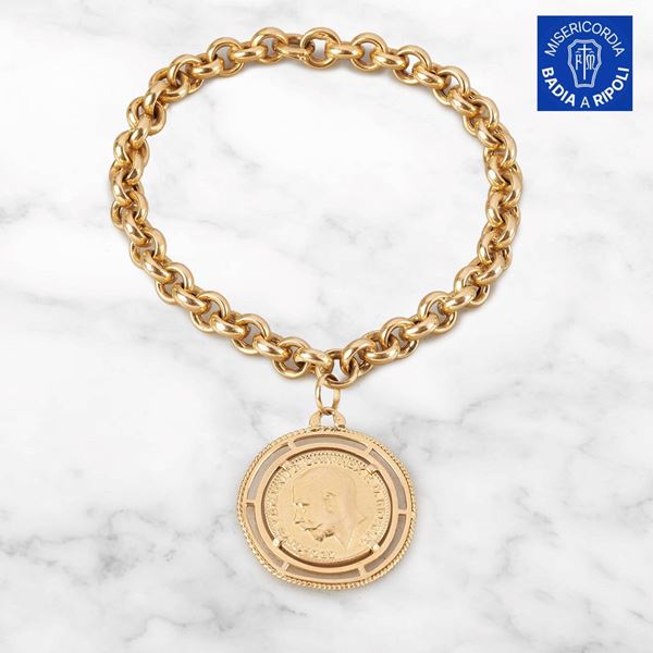 



BRACCIALE IN ORO GIALLO 18KT E STERLINA