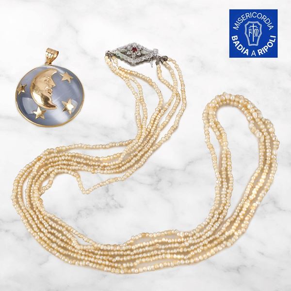 



PENDENTE CIRCOLARE IN PASTA VITREA E DECORAZIONI IN ORO