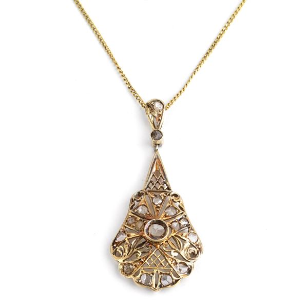 



COLLANA E PENDENTE IN ORO A BASSO TITOLO E DIAMANTI