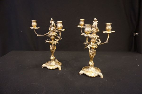 



Coppia di candelabri, di gusto rocaille