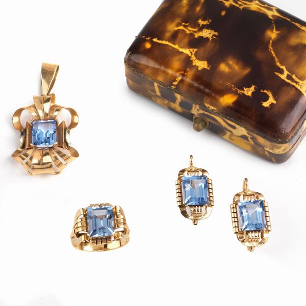 



PARURE IN ORO GIALLO 18KT E PIETRE