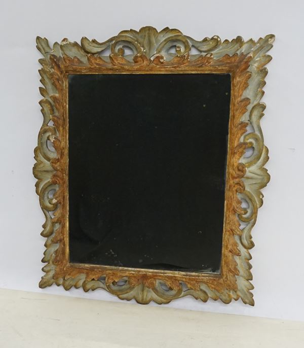 Specchiera, sec. XVII entro cornice in legno laccato e intagliato, cm 92x78, luce cm 67x54, restauri