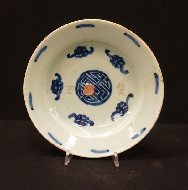 



PIatto, Cina, sec. XX, in ceramica nei toni del verde e del blu, diam. cm 20,5