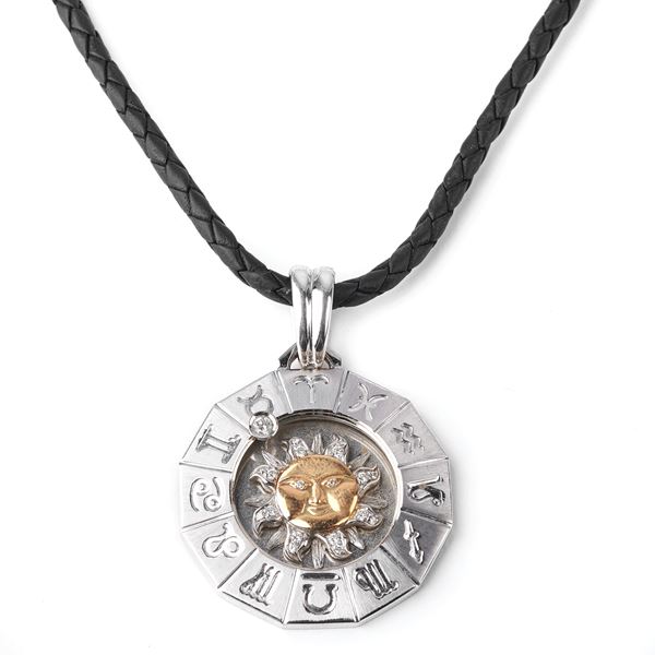 



PENDENTE IN ORO BIANCO, ORO GIALLO 18 KT E DIAMANTI