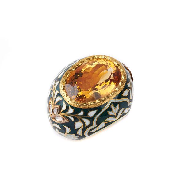 



ANELLO IN ORO GIALLO 20 KT, SMALTO E TOPAZIO 