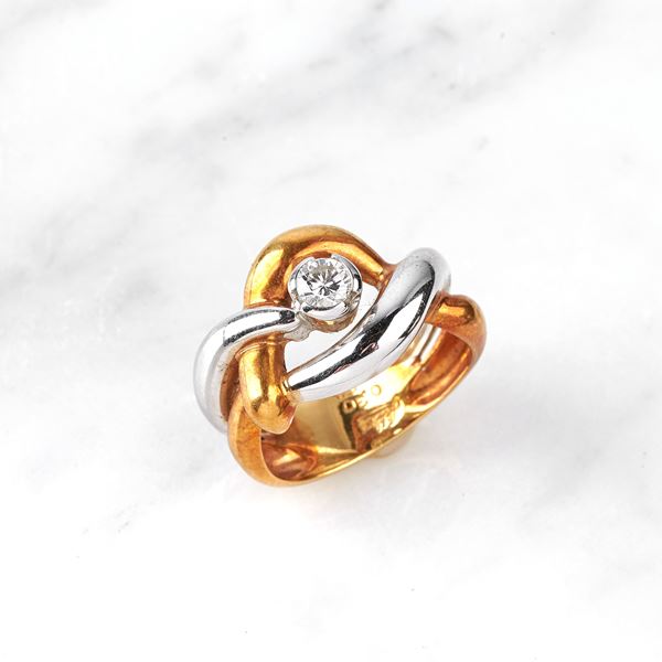 



ANELLO IN ORO GIALLO, ORO BIANCO 18 KT E DIAMANTE