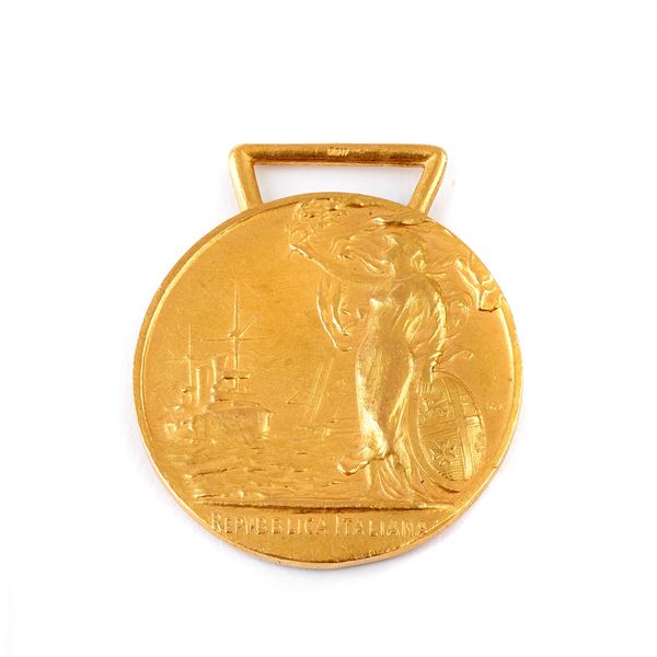



MEDAGLIA IN ORO GIALLO 18 KT
