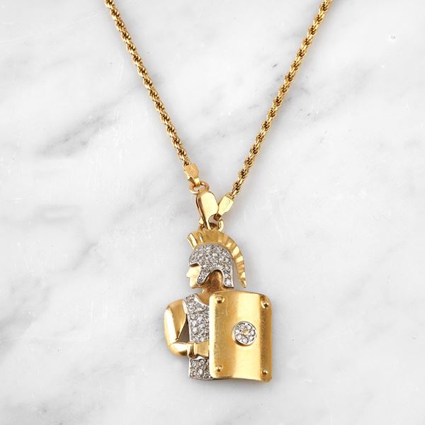 



COLLANA CON PENDENTE IN ORO GIALLO 18 KT E DIAMANTI