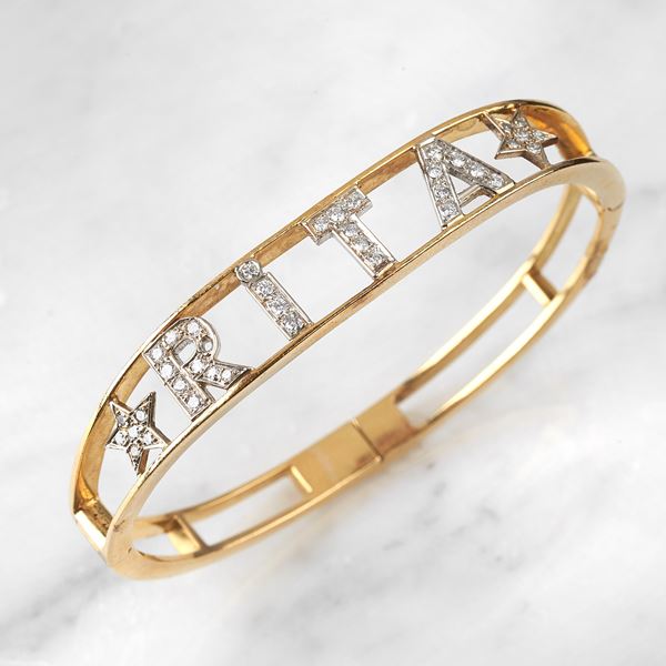



BRACCIALE RIGIDO IN ORO GIALLO 18 KT E DIAMANTI