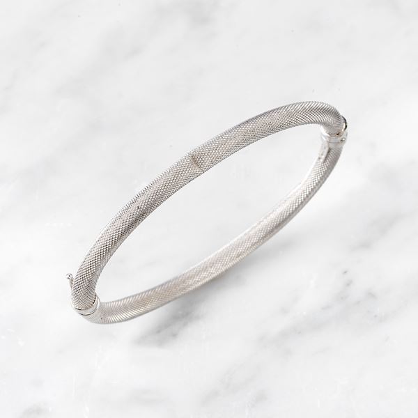 



BRACCIALE RIGIDO IN ORO BIANCO 18KT