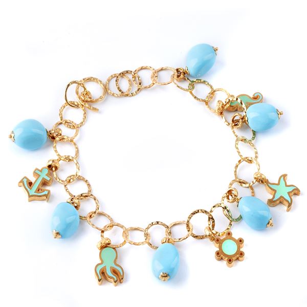 



BRACCIALE IN ORO GIALLO 18KT E CHARMS