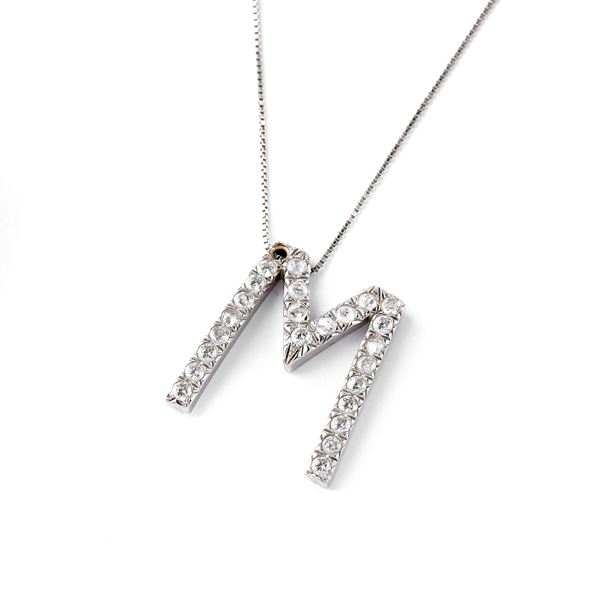 



COLLANA GIROCOLLO E PENDENTE IN ORO BIANCO 18KT