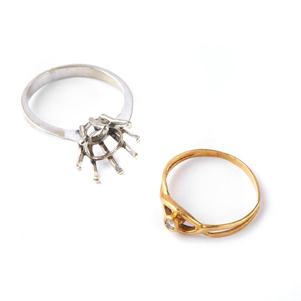 



MONTATURA PER ANELLO E ANELLO IN ORO GIALLO 18KT CON PICCOLO BRILLANTE