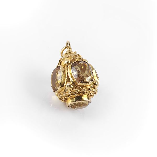 



PENDENTE IN ORO GIALLO 18KT E TOPAZI