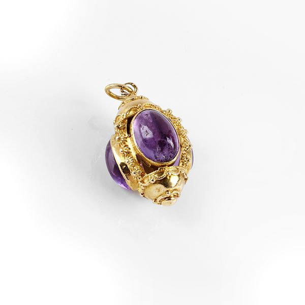 



PENDENTE IN ORO GIALLO 18KT E AMETISTE