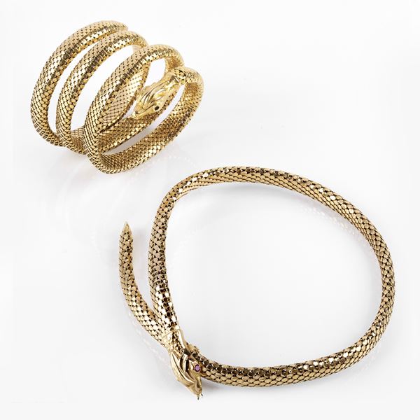 



DEMI- PARURE IN ORO GIALLO 18 KT