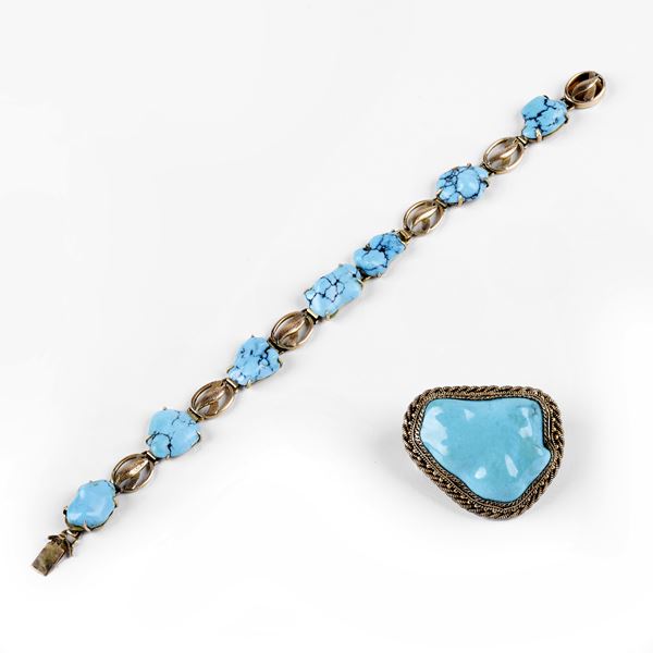 



BRACCIALE IN ORO GIALLO 9KT E TURCHESI