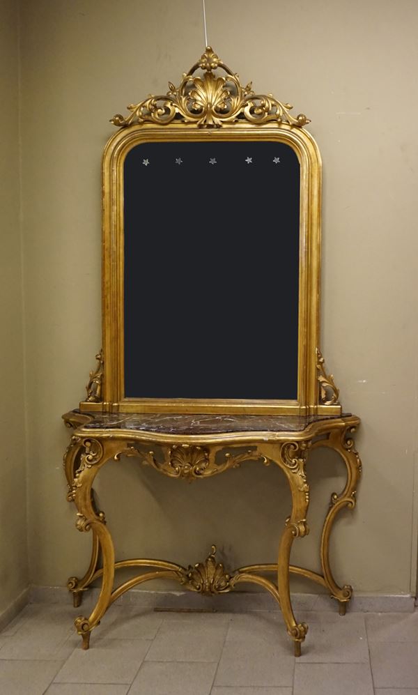 



Consolle con specchiera, inizi sec. XX  - Asta Arredi e Mobili dal XVII al XX secolo - Poggio Bracciolini Casa d'Aste