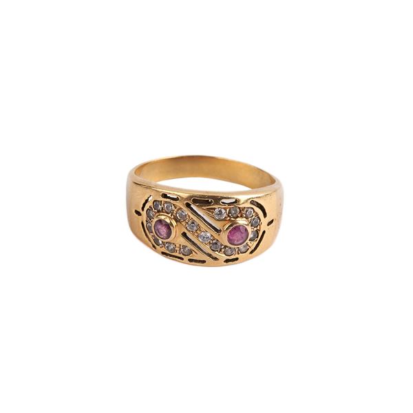 



ANELLO IN ORO GIALLO 18KT E PIETRE
