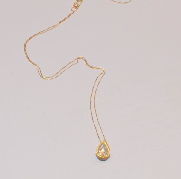 



CATENA CON PENDENTE&nbsp; IN ORO 18KT E DIAMANTE