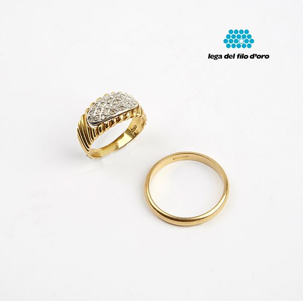 



ANELLO IN ORO GIALLO 18KT E DIAMANTI