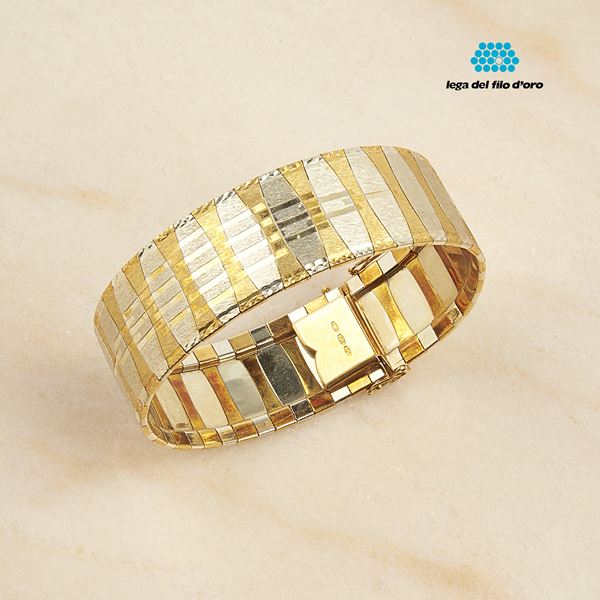 



BRACCIALE IN ORO GIALLO , ORO BIANCO 18KT 